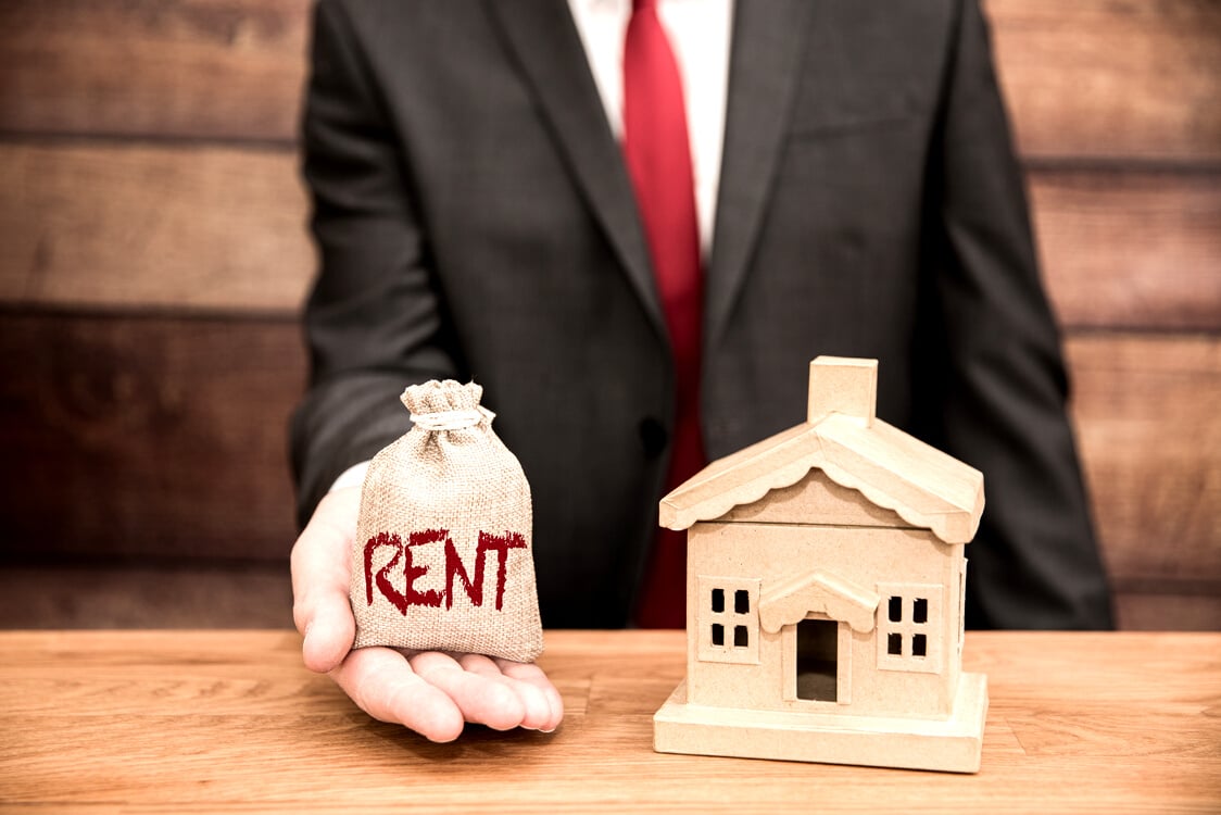 A renting or rent housing concept with a landlord demanding property rent